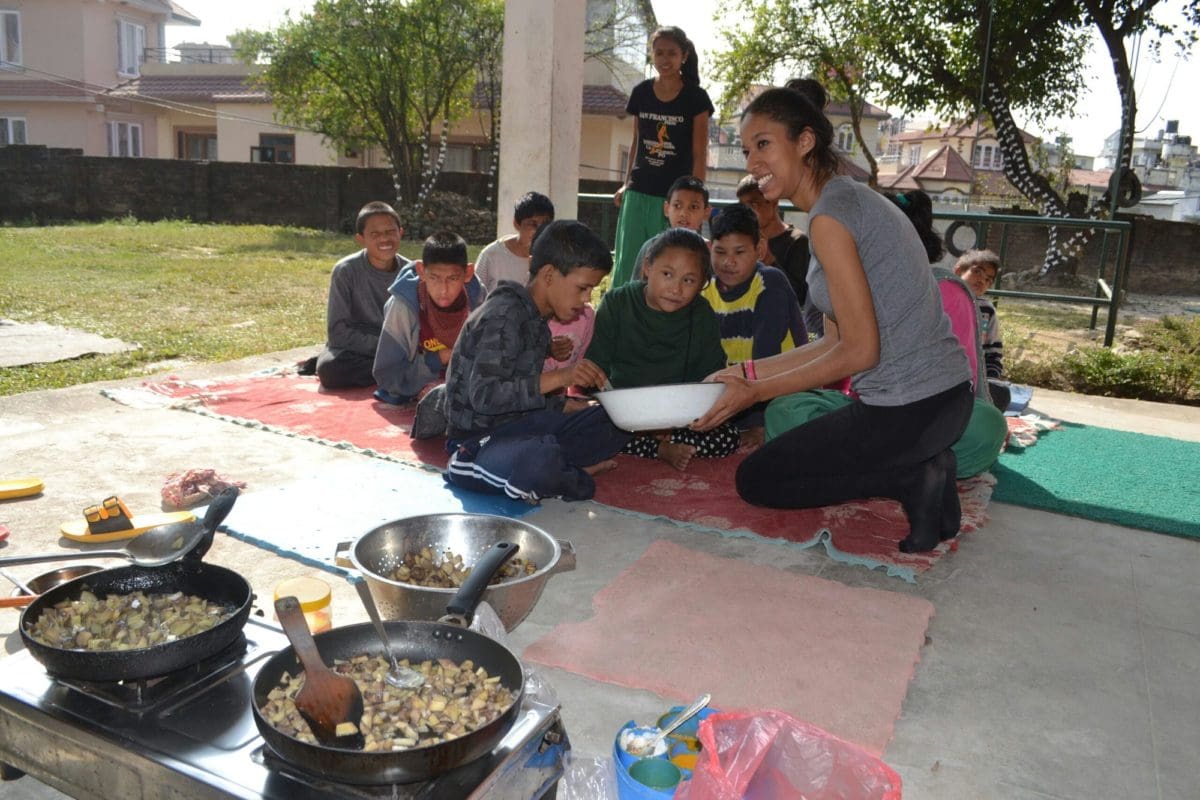 Career Break Volunteer in Nepal assisting with meal times