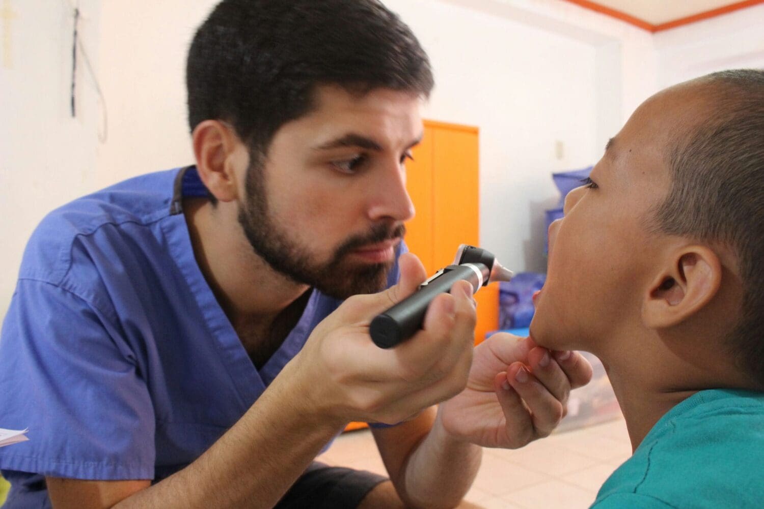 Medical Volunteer doing a checkup