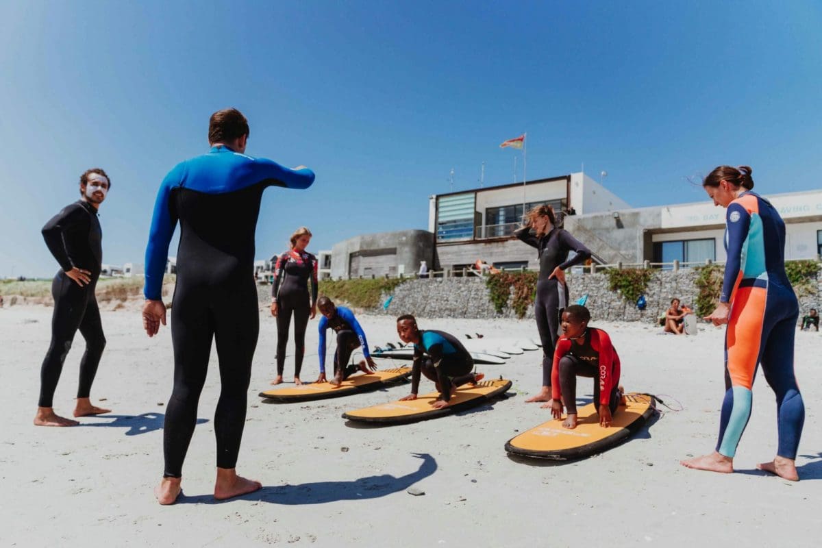 Teach Surfing to children in South Africa