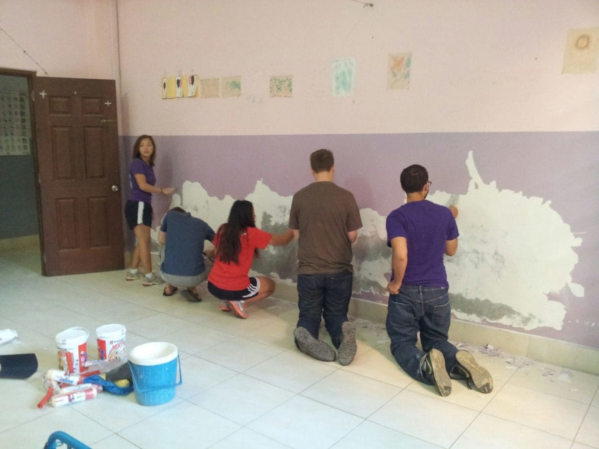 Volunteer Group painting a local school classroom