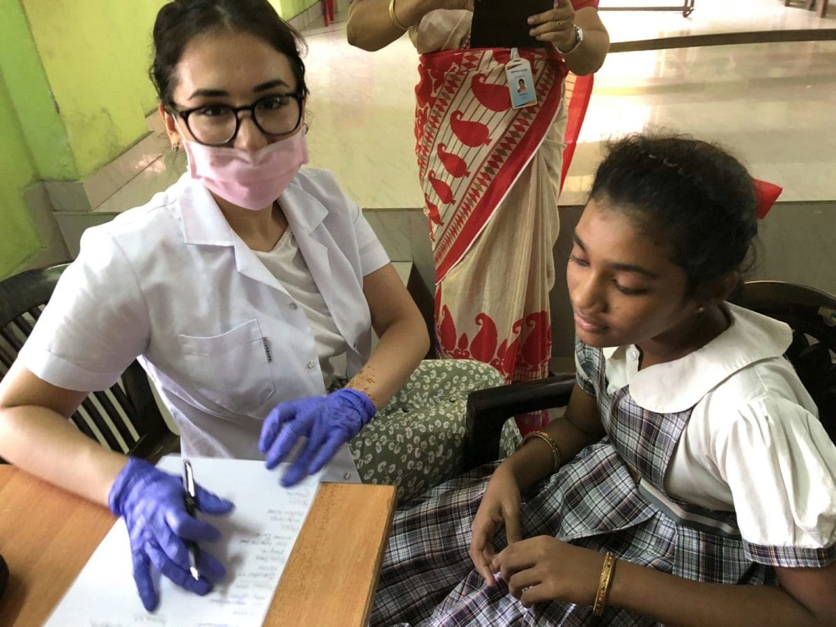 Medical student running a camp in school