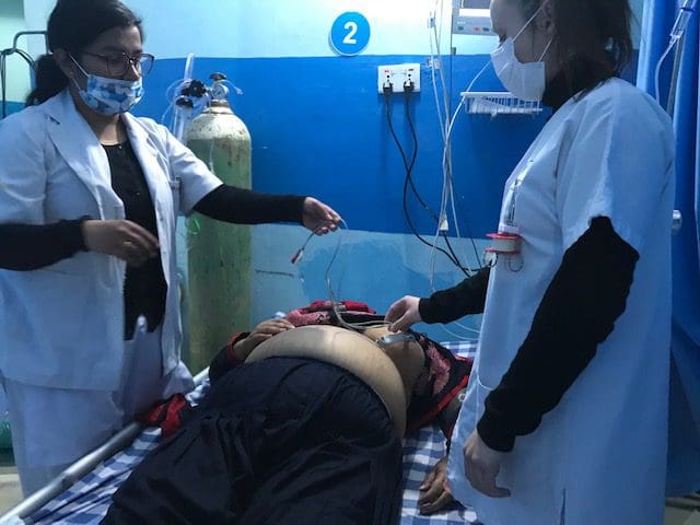 Medical volunteers in Nepal assessing patients