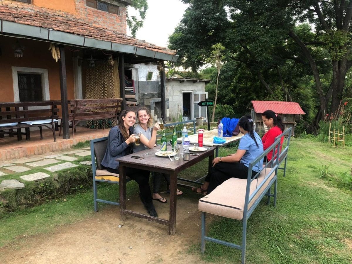 Volunteer in Nepal having lunch together