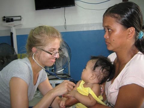 Medical Volunteer in Philippines with patient